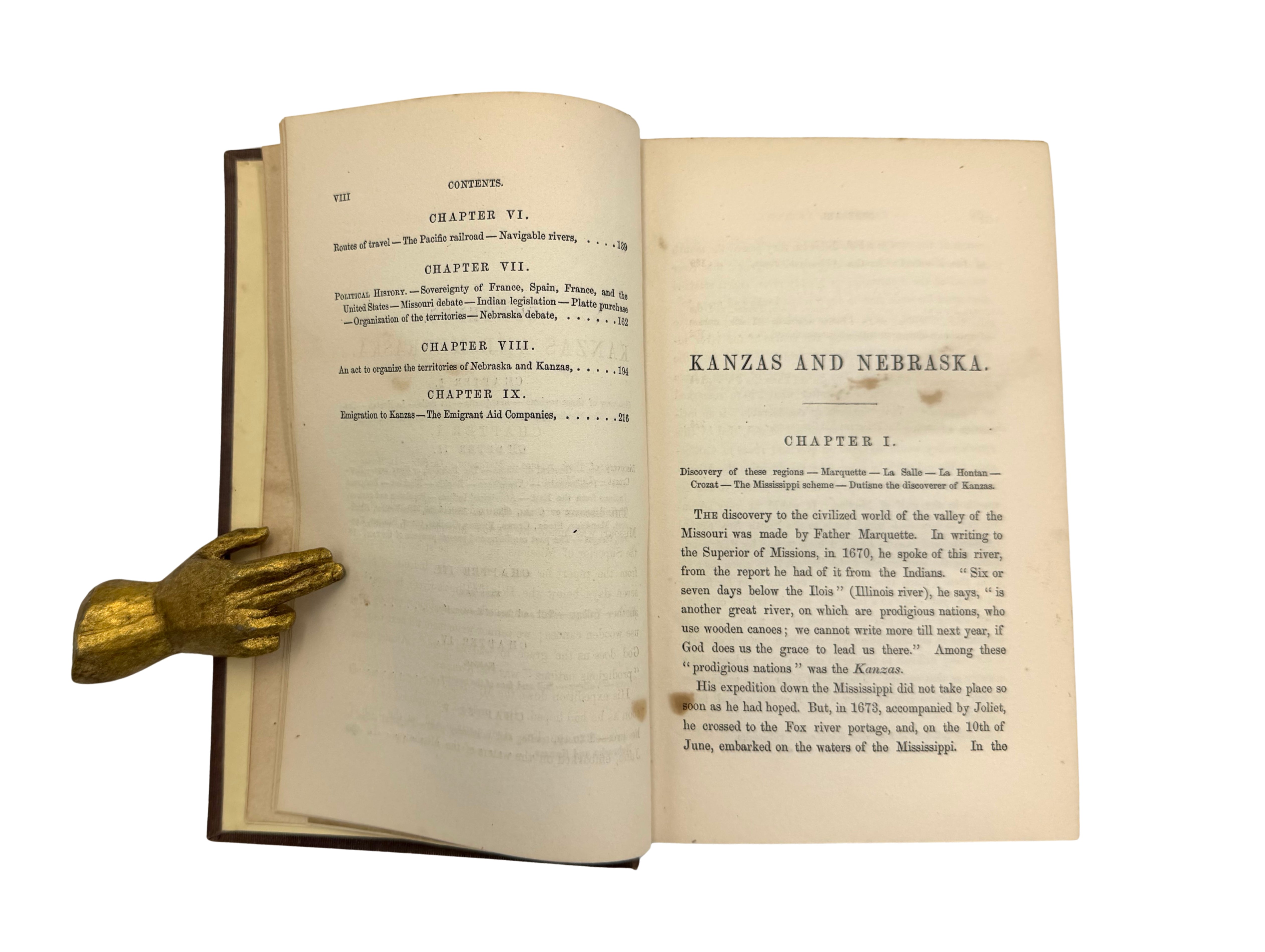 Open book showing the last page of Contents and Chapter list, and the first page of Chapter 1