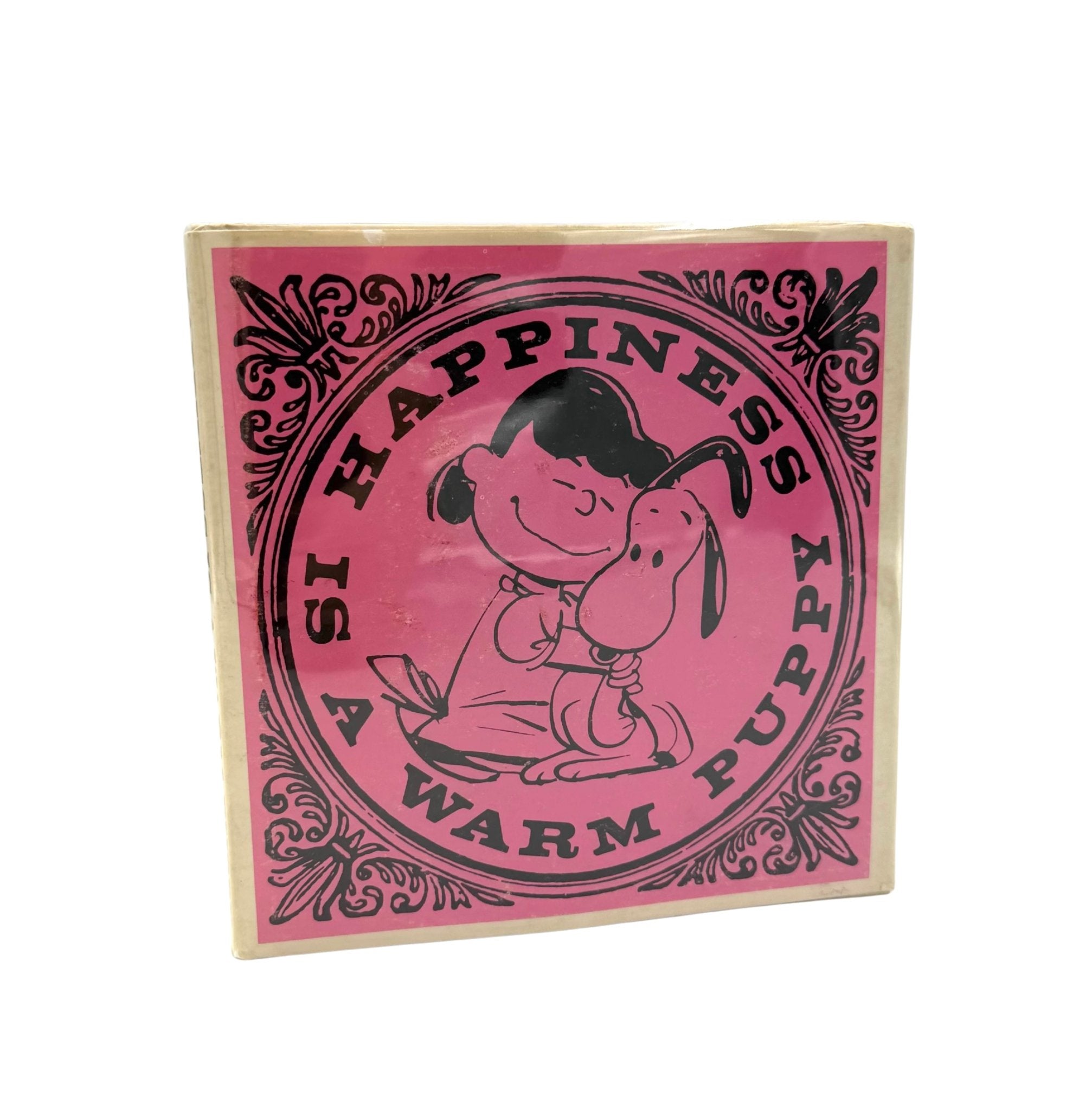Happiness is a Warm Puppy by Charles M. Schulz, First Edition, Second Issue in Original Dust Jacket, 1962 - The Great Republic