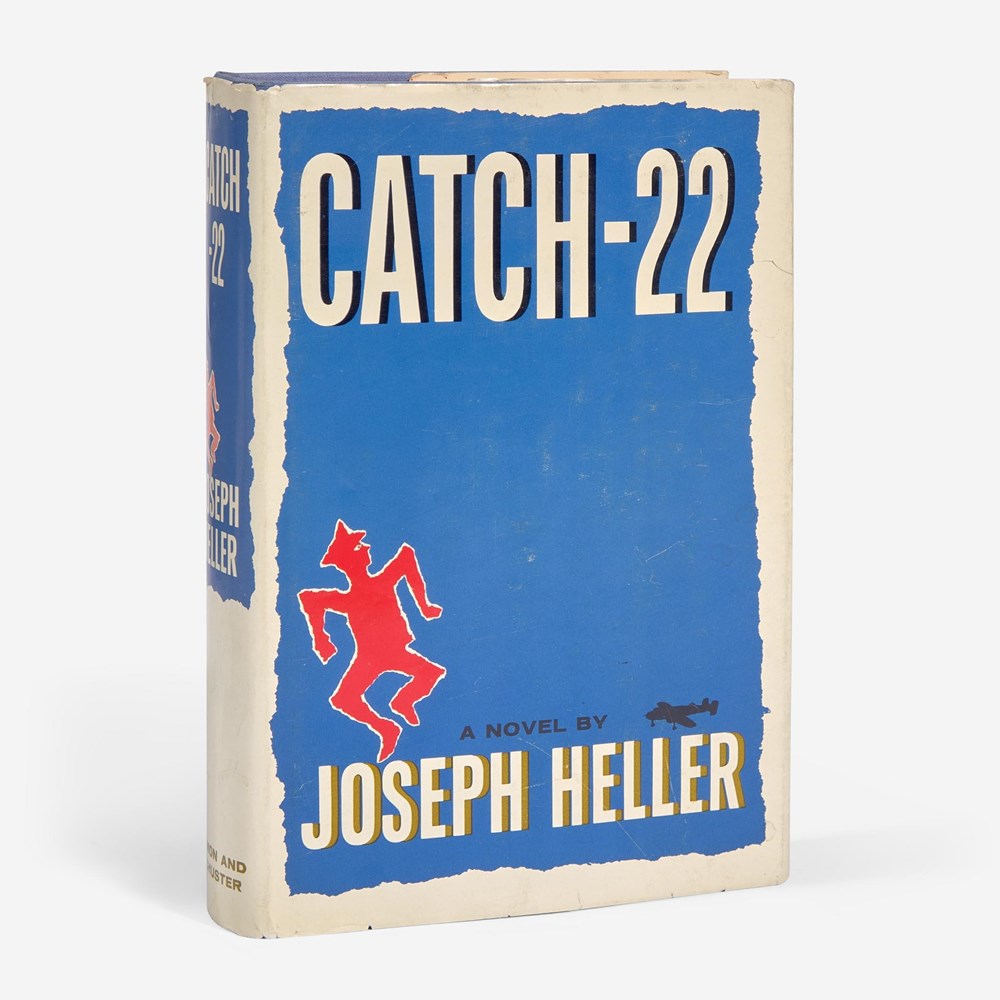 The novel and it's clamshell, with the novel slightly staggered in front right of the clamshell. The clamshell features a inset of the cover art from the original dustjacket, amongst a red and blue backdrop.