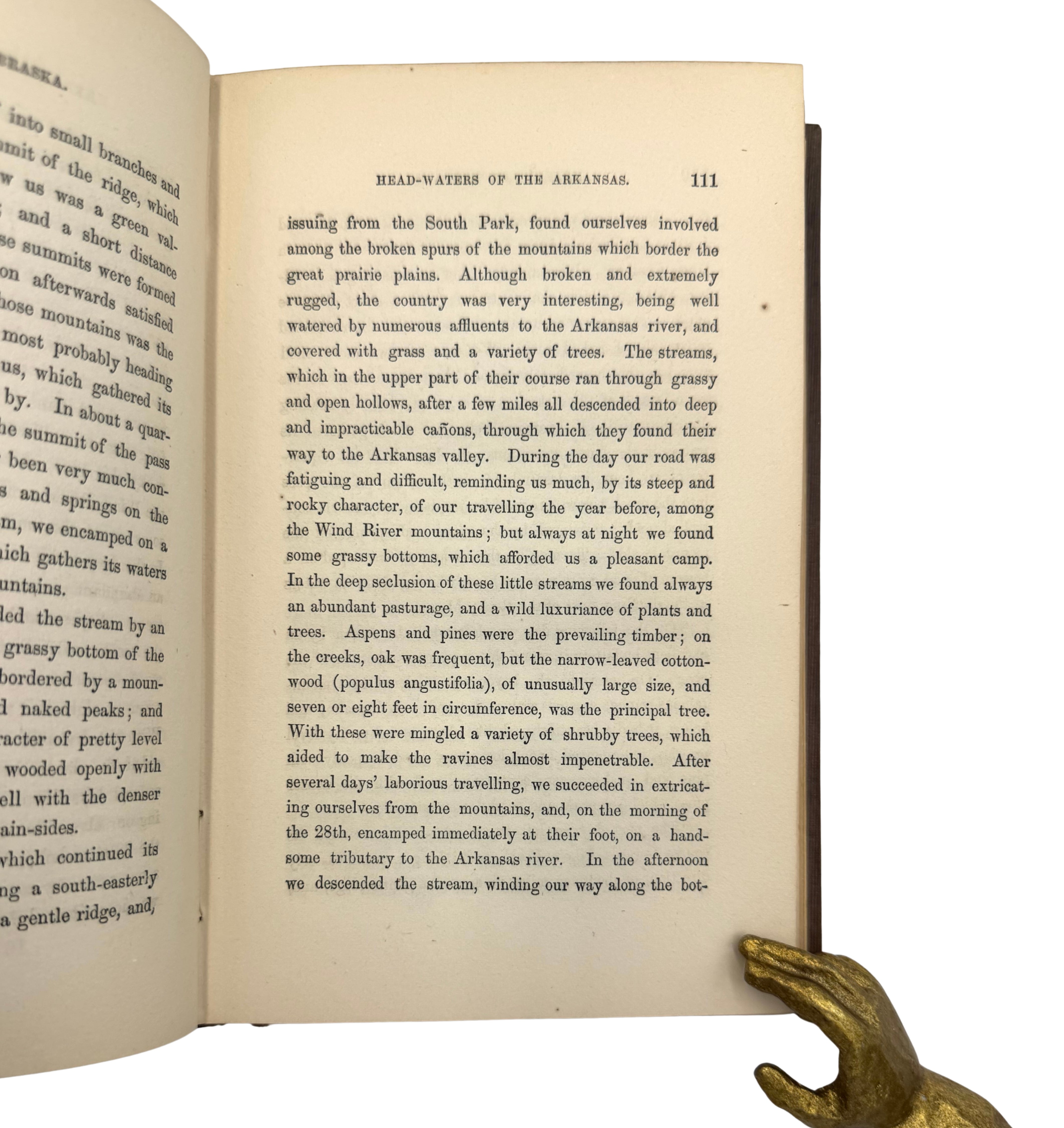 Open book with text on a white background
