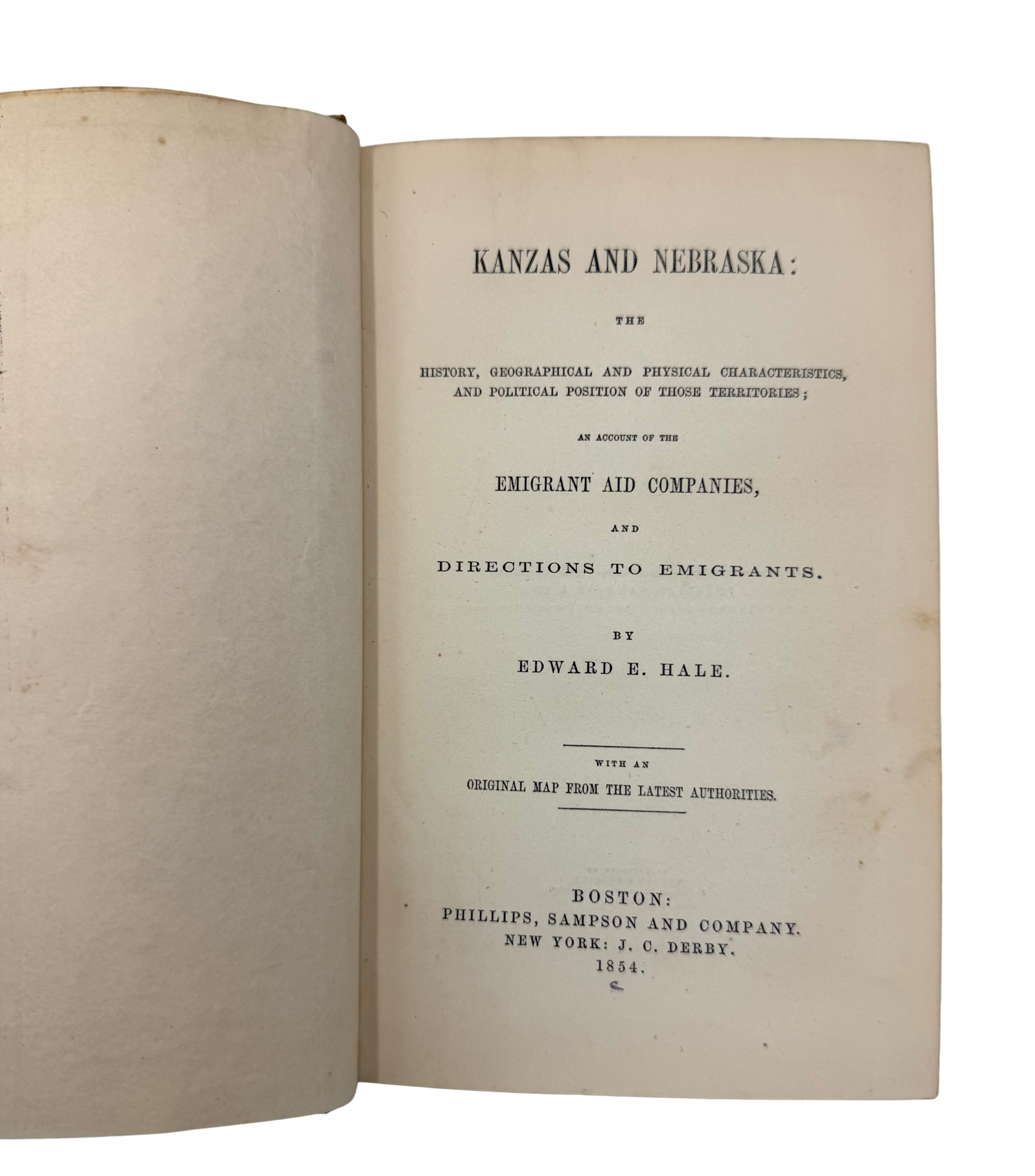 Open book with title page on a white background