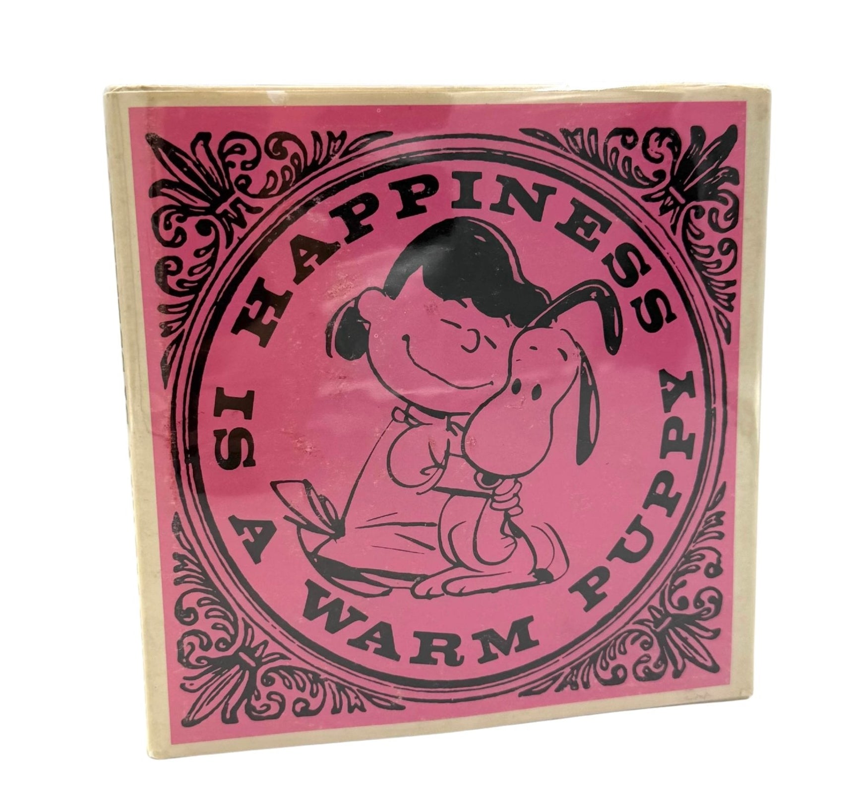 Happiness is a Warm Puppy by Charles M. Schulz, First Edition, Second Issue in Original Dust Jacket, 1962 - The Great Republic