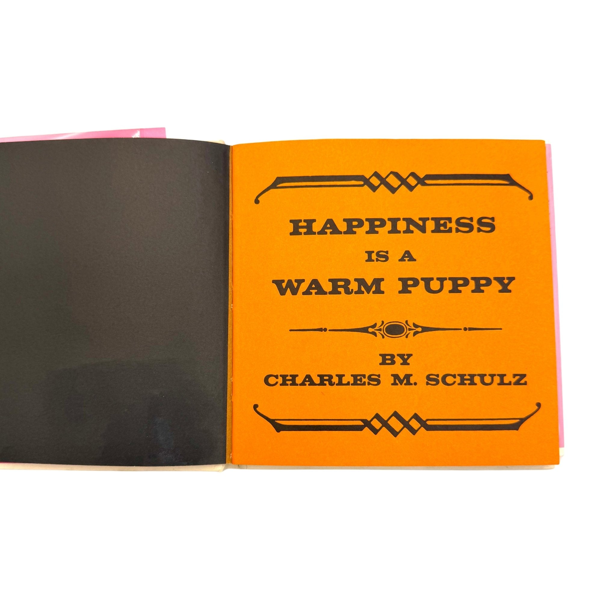 Happiness is a Warm Puppy by Charles M. Schulz, First Edition, Second Issue in Original Dust Jacket, 1962 - The Great Republic