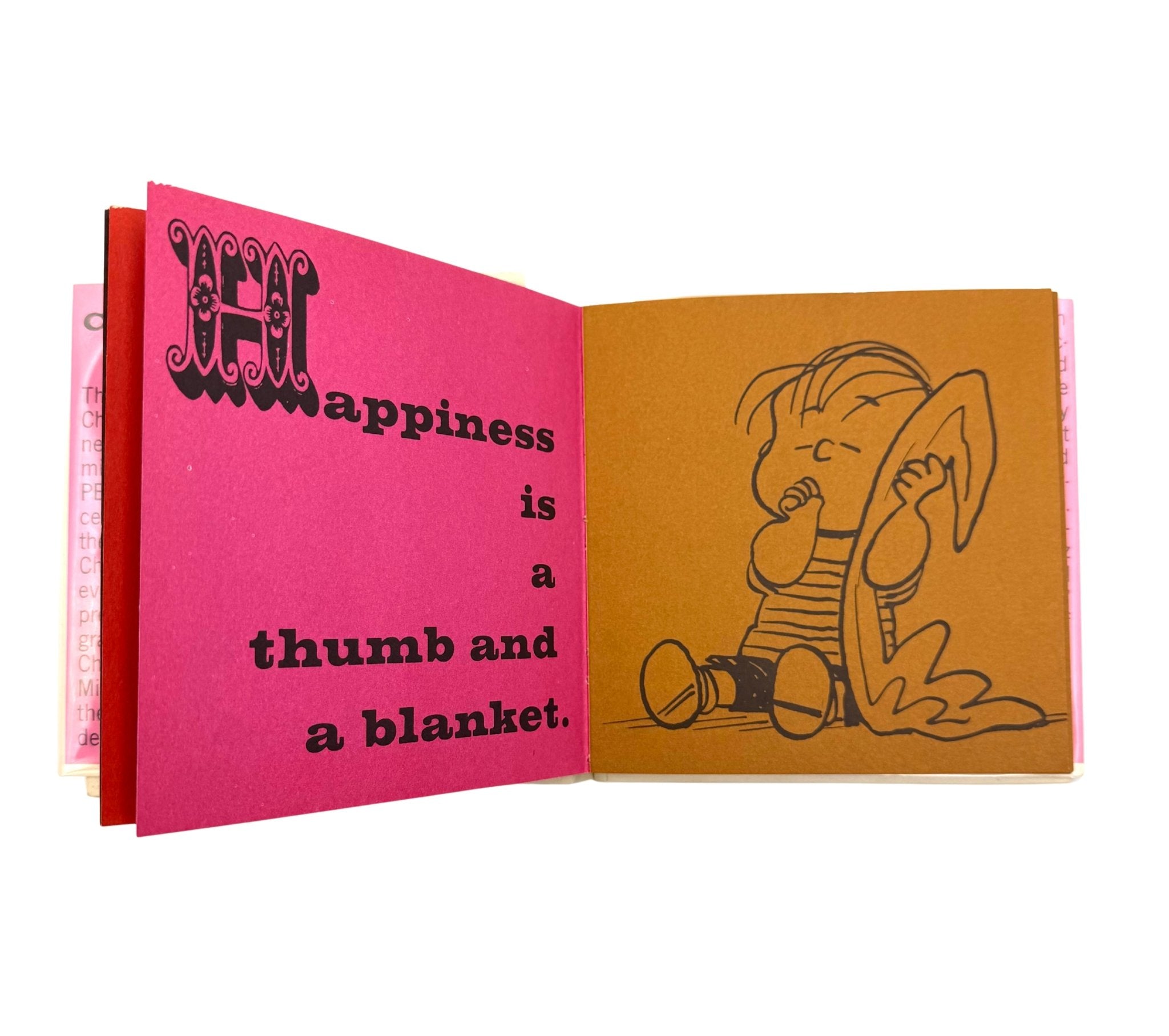 Happiness is a Warm Puppy by Charles M. Schulz, First Edition, Second Issue in Original Dust Jacket, 1962 - The Great Republic